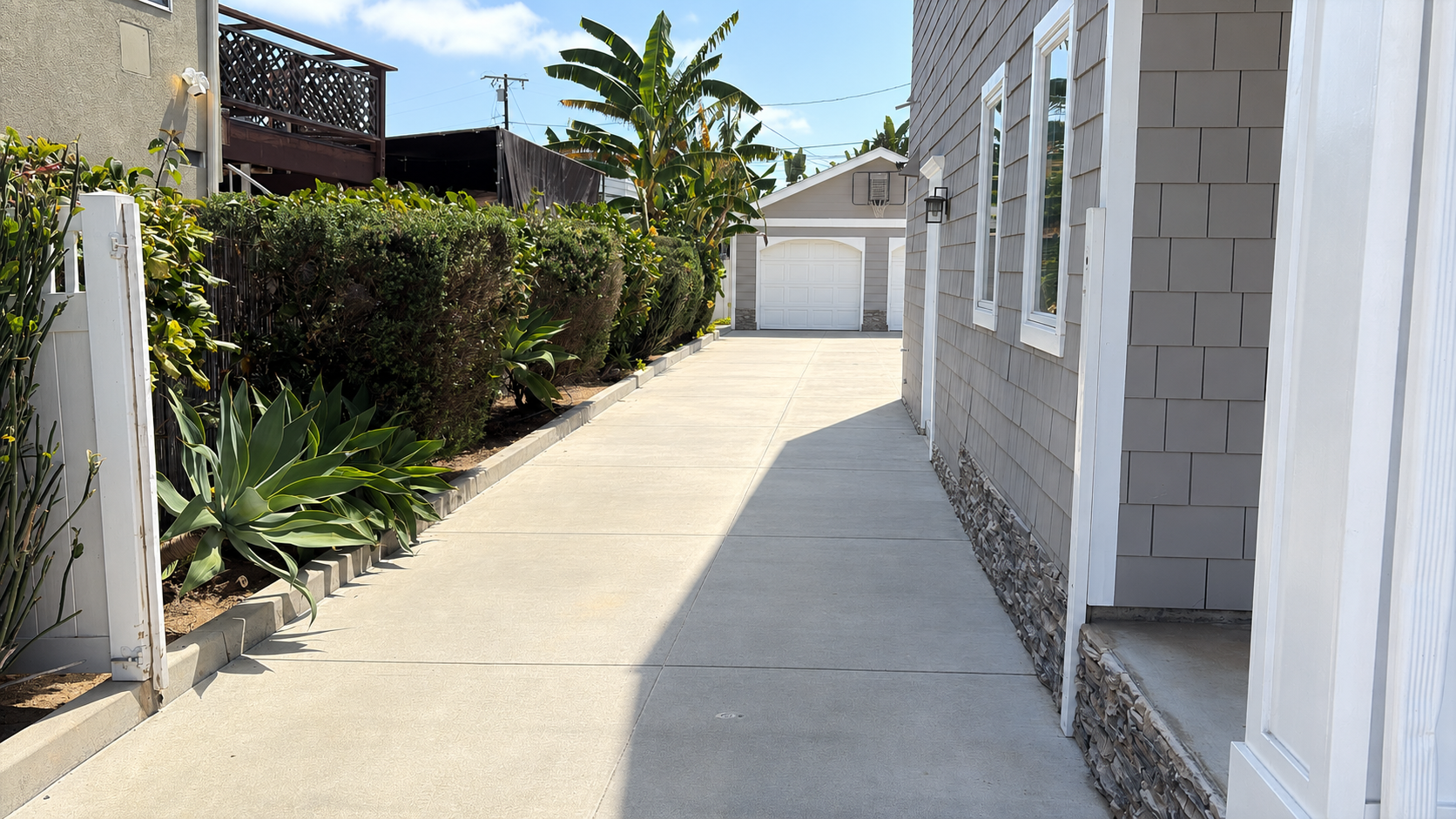Custom White Aluminum Driveway Gate in Costa Mesa, CA