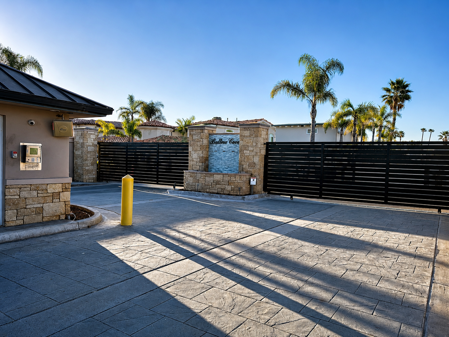 Iron Master sliding driveway gate installation in Newport Beach, California